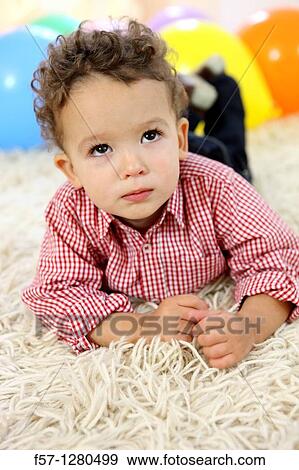 Two year old boy View Large Photo Image Stock Photo - Two year old boy. Fotosearch