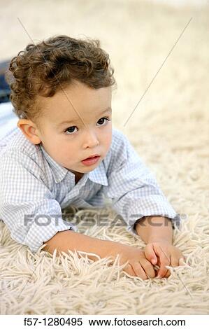 Two year old boy View Large Photo Image Stock Photography - Two year old boy. Fotosearch