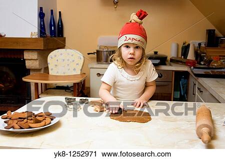 Two Years Old Girl Cooking Gingerbread View Large Photo Image Stock Image - Two Years Old Girl Cooking Gingerbread. Fotosearch