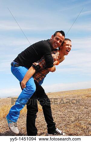 Two young men, happy, fun View Large Photo Image Picture - Two young men, happy, fun. Fotosearch