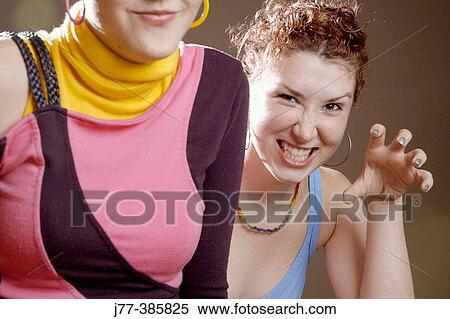 Two young women going dancing View Large Photo Image Stock Photography - Two young women going dancing. Fotosearch