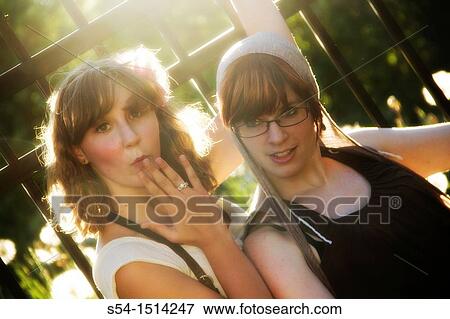 Stock Photo - Two young women outdoors in Spokane, Washington, USA.. Fotosearch