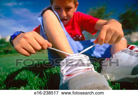 tying shoes View Large Photo Image Stock Photo - tying shoes. Fotosearch