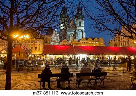 Stock Image - Tyn Cathedral in Old Town Square during Christmas time, Prague, Czech Republic. Fotosearch