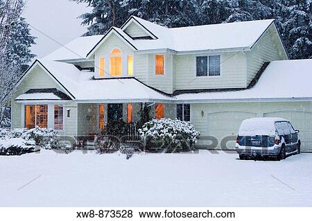 Stock Photo - Typical American suburban home in winter. Fotosearch