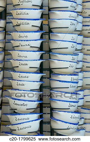 Typical breton crockery bowls with names, Old town, Dinan, Brittany, Cotes d? Armor, France View Large Photo Image Stock Photography - Typical breton crockery bowls with names, Old town, Dinan, Brittany, Cotes d? Armor, France. Fotosearch