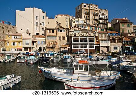 Typical harbour and houses of the Vallon des Auffes, coast road/corniche, Marseille, Bouches du Rhone, 13, France. View Large Photo Image Stock Photography - Typical harbour and houses of the Vallon des Auffes, coast road/corniche, Marseille, Bouches du Rhone, 13, France.. Fotosearch