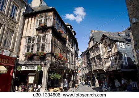 Stock Photograph - Typical houses in the old town of Dinan, in Cotes d? Armor department, Brittany France. Fotosearch