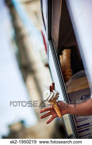 Typical ice cream cone with from a street van in London, near Tower Bridge. View Large Photo Image Stock Photo - Typical ice cream cone with from a street van in London, near Tower Bridge.. Fotosearch