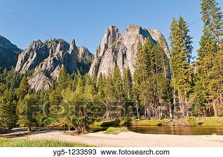 Stock Image - Typical landscape in the morning, with Merced River in Yosemite National Park, California, USA. Fotosearch