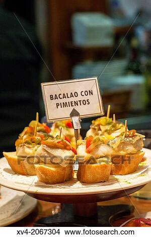 Typical Pintxos, also called tapas at popular San Sebastian bar, Basque Country, Spain. View Large Photo Image Picture - Typical Pintxos, also called tapas at popular San Sebastian bar, Basque Country, Spain.. Fotosearch