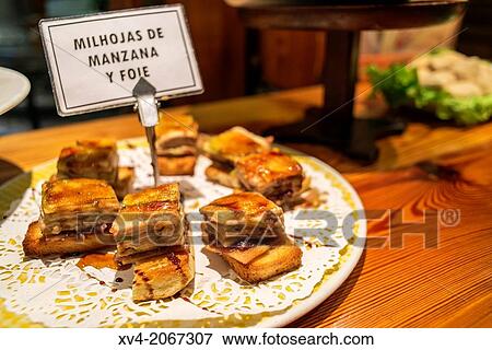 Typical Pintxos, also called tapas at popular San Sebastian bar, Basque Country, Spain. View Large Photo Image Stock Photo - Typical Pintxos, also called tapas at popular San Sebastian bar, Basque Country, Spain.. Fotosearch
