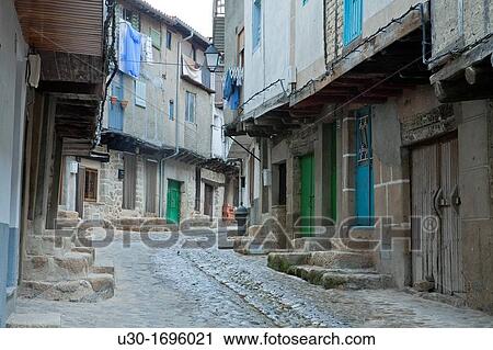 Typical street and houses of San Mart? n de Trevejo, small village declarated Historical-Artistic Site, located in Sierra de Gata CBceres Extremadura Spain View Large Photo Image Stock Image - Typical street and houses of San Mart? n de Trevejo, small village declarated Historical-Artistic Site, located in Sierra de Gata CBceres Extremadura Spain. Fotosearch