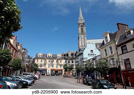 Typical street in the town of Cobh With its cathedral background, Ireland, Europe. View Large Photo Image Stock Image - Typical street in the town of Cobh With its cathedral background, Ireland, Europe.. Fotosearch