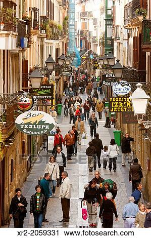 Typical street to eat pintxos, known as Fermin Calbeton street in Donostia - San Sebastian, Basque Country, Spain. View Large Photo Image Stock Image - Typical street to eat pintxos, known as Fermin Calbeton street in Donostia - San Sebastian, Basque Country, Spain.. Fotosearch