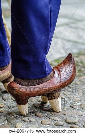 Typical wood shoes of rural areas of Cantabria also called "zuecos". Santillana del Mar, dressing exhibition. Cantabria. View Large Photo Image Stock Photography - Typical wood shoes of rural areas of Cantabria also called "zuecos". Santillana del Mar, dressing exhibition. Cantabria.. Fotosearch