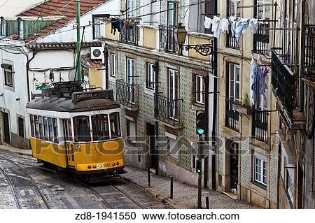 typical yellow tram in alfama town in lisbon. portugal View Large Photo Image Stock Image - typical yellow tram in alfama town in lisbon. portugal. Fotosearch