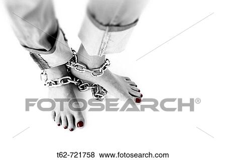 Uas pintadas y cadenas en los pies. View Large Photo Image Stock Photo - Uas pintadas y cadenas en los pies.. Fotosearch