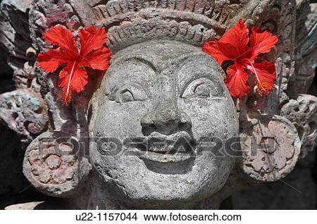 Ubud (Bali, Indonesia): a Hindu statue, at the entrance of a house View Large Photo Image Picture - Ubud (Bali, Indonesia): a Hindu statue, at the entrance of a house. Fotosearch