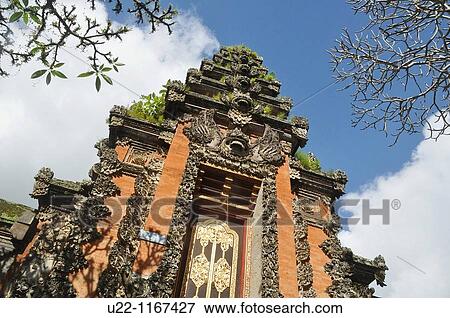 Stock Photo - Ubud (Bali, Indonesia): a Hindu's temple near the Ubud Palace. Fotosearch