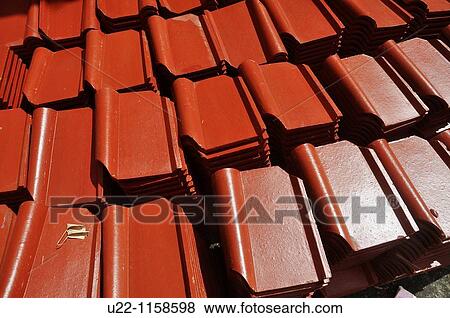 Ubud (Bali, Indonesia): roof tiles ready to be used in a house construction View Large Photo Image Stock Photo - Ubud (Bali, Indonesia): roof tiles ready to be used in a house construction. Fotosearch