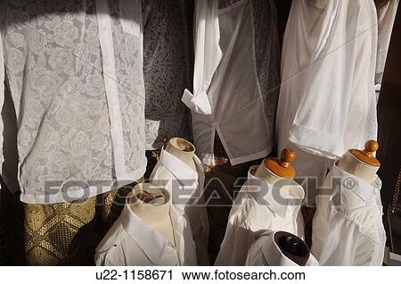 Ubud (Bali, Indonesia): traditional Balinese men's shirts sold at a tailor's shop View Large Photo Image Stock Image - Ubud (Bali, Indonesia): traditional Balinese men's shirts sold at a tailor's shop. Fotosearch