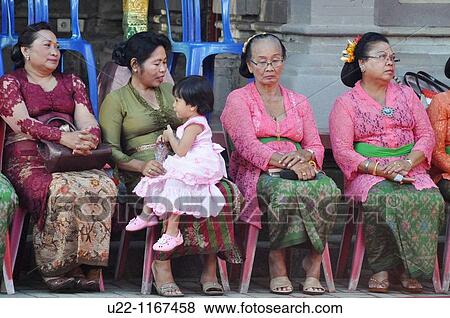 Ubud (Bali, Indonesia): women in traditional dresses, at a gathering at the Ubud Palace View Large Photo Image Stock Photo - Ubud (Bali, Indonesia): women in traditional dresses, at a gathering at the Ubud Palace. Fotosearch