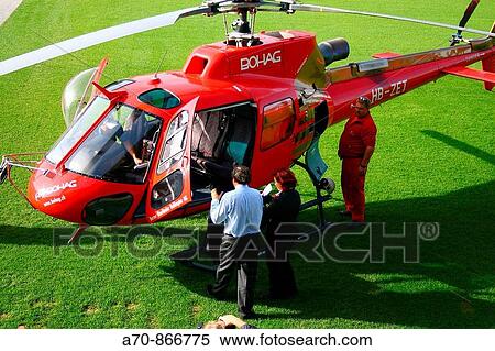 Stock Photography - UEFA Euro 2008. UEFA boss Michel Platini getting into an helicopter.. Fotosearch