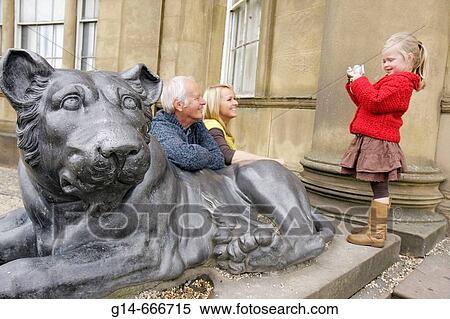 UK, England, Lancashire, Manchester, Heaton Park, Heaton Hall, girl, camera, mother, grandfather, lion statue, View Large Photo Image Stock Photography - UK, England, Lancashire, Manchester, Heaton Park, Heaton Hall, girl, camera, mother, grandfather, lion statue,. Fotosearch