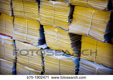 UK, England, London, Piles of packed newspapers View Large Photo Image Stock Image - UK, England, London, Piles of packed newspapers. Fotosearch
