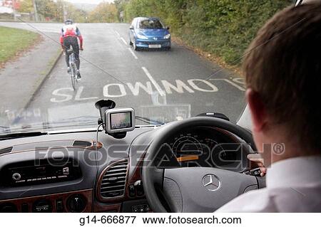 UK, England, North Yorkshire, Addington, tour coach bus driver, bicyclist, cyclist, road, traffic, View Large Photo Image Stock Photo - UK, England, North Yorkshire, Addington, tour coach bus driver, bicyclist, cyclist, road, traffic,. Fotosearch