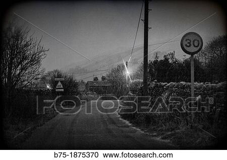 Stock Image - UK, England, North Yorkshire, Yorkshire Dales, Kettlewell, road. Fotosearch