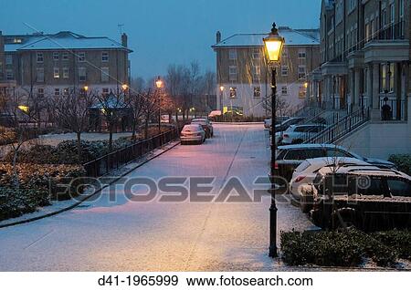 Stock Photo - UK, England, Surrey, house at dusk.. Fotosearch