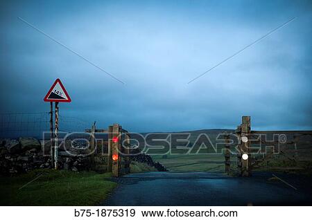 UK, England, Yorkshire, The Dales, Rural road, with Cattle Grid and signal slope View Large Photo Image Stock Photo - UK, England, Yorkshire, The Dales, Rural road, with Cattle Grid and signal slope. Fotosearch