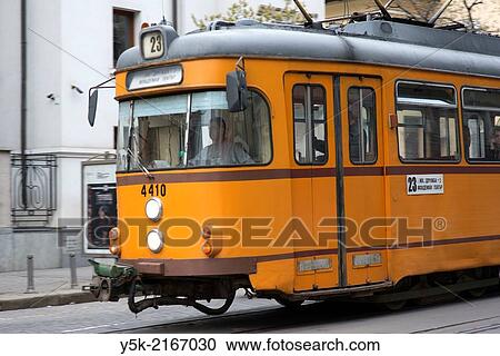 Ulitsa Shipka, Sofia, Bulgaria. Old tram trolley, line 23, slowly driving through the streets of Sofia. Usually the public transportation system in Sofia is equipped with old material, dating back to the dark days of communism. View Large Photo Image Stock Image - Ulitsa Shipka, Sofia, Bulgaria. Old tram trolley, line 23, slowly driving through the streets of Sofia. Usually the public transportation system in Sofia is equipped with old material, dating back to the dark days of communism.. Fotosearch