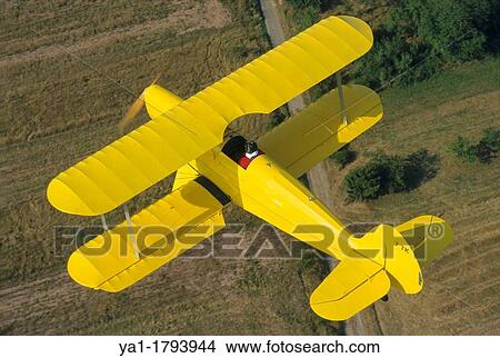 Ultra light biplane Kiebitz flying over France View Large Photo Image Picture - Ultra light biplane Kiebitz flying over France. Fotosearch