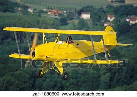 Ultra light biplane Kiebitz flying over France View Large Photo Image Stock Image - Ultra light biplane Kiebitz flying over France. Fotosearch