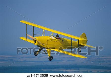 Ultra light biplane Kiebitz flying over France View Large Photo Image Stock Photo - Ultra light biplane Kiebitz flying over France. Fotosearch