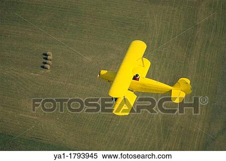 Ultra light biplane Kiebitz flying over France View Large Photo Image Stock Photography - Ultra light biplane Kiebitz flying over France. Fotosearch