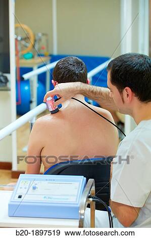 Ultrasound to treat trapezius muscle contractures Physiotherapy medical center, Donostia, San Sebastian, Gipuzkoa, Basque Country, Spain View Large Photo Image Stock Photo - Ultrasound to treat trapezius muscle contractures Physiotherapy medical center, Donostia, San Sebastian, Gipuzkoa, Basque Country, Spain. Fotosearch