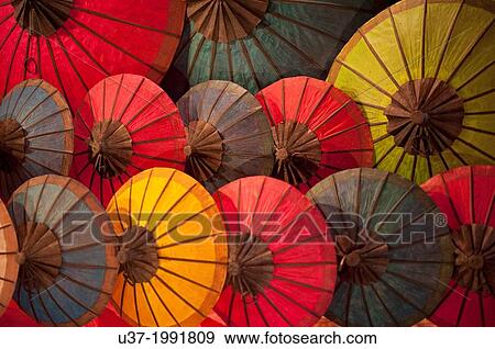 Umbrellas for sale at Luang Phrabang night market. Laos. View Large Photo Image Stock Photo - Umbrellas for sale at Luang Phrabang night market. Laos.. Fotosearch