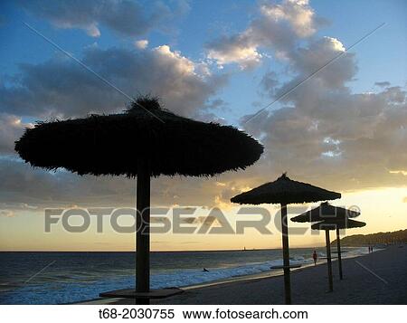 Umbrellas on the beach, Altafulla, Tarragona, Spain1015 View Large Photo Image Stock Photography - Umbrellas on the beach, Altafulla, Tarragona, Spain1015. Fotosearch