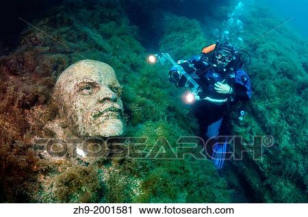 Underwater museum "Reddening leaders", Vladimir Ilyich Ulyanov, Lenin, sculpture, Cape Tarhankut, Tarhan Qut, Black sea, Crimea, Ukraine, Eastern Europe. View Large Photo Image Stock Image - Underwater museum "Reddening leaders", Vladimir Ilyich Ulyanov, Lenin, sculpture, Cape Tarhankut, Tarhan Qut, Black sea, Crimea, Ukraine, Eastern Europe.. Fotosearch