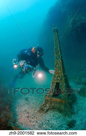 Underwater museum "Reddening leaders" Eiffel Tower sculpture. Cape Tarhankut, Tarhan Qut, Black sea, Crimea, Ukraine, Eastern Europe. View Large Photo Image Stock Image - Underwater museum "Reddening leaders" Eiffel Tower sculpture. Cape Tarhankut, Tarhan Qut, Black sea, Crimea, Ukraine, Eastern Europe.. Fotosearch