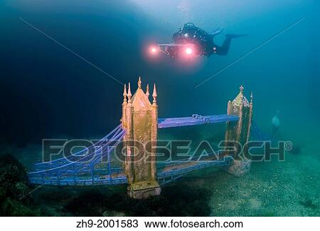 Stock Image - Underwater museum "Reddening leaders" Tower Bridge sculpture. Cape Tarhankut, Tarhan Qut, Black sea, Crimea, Ukraine, Eastern Europe.. Fotosearch