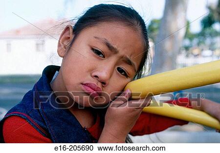 Stock Image - unhappy school girl. Fotosearch