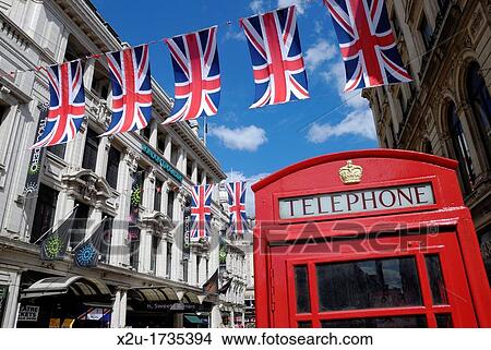 Union Jack flags and red telephone box near the Trocadero, Picadilly Circus, London, UK View Large Photo Image Picture - Union Jack flags and red telephone box near the Trocadero, Picadilly Circus, London, UK. Fotosearch