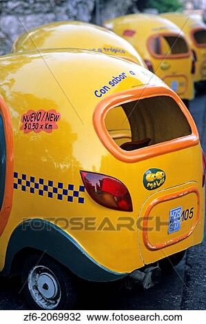 Unique Abstract of Colorful Coco Taxis Old Havana Cuba. View Large Photo Image Stock Image - Unique Abstract of Colorful Coco Taxis Old Havana Cuba.. Fotosearch