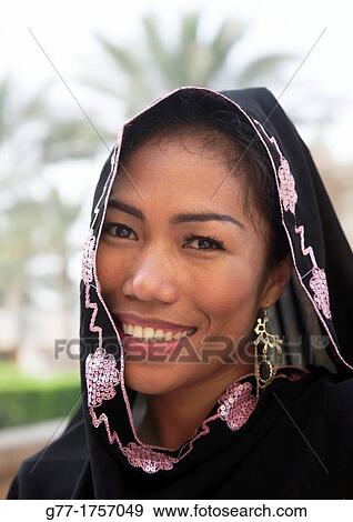 United Arab Emirates Abu Dhabi Middle eastern woman. View Large Photo Image Stock Photo - United Arab Emirates Abu Dhabi Middle eastern woman.. Fotosearch