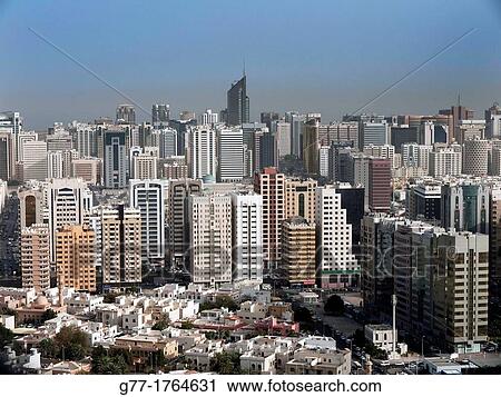 United Arab Emirates Abu Dhabi. Modern skyscrapers and typical arab houses. View Large Photo Image Stock Image - United Arab Emirates Abu Dhabi. Modern skyscrapers and typical arab houses.. Fotosearch